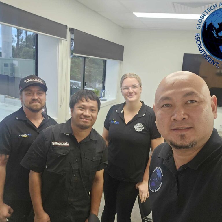 Diverse work team showing successful Philippine-Australia migration partnership